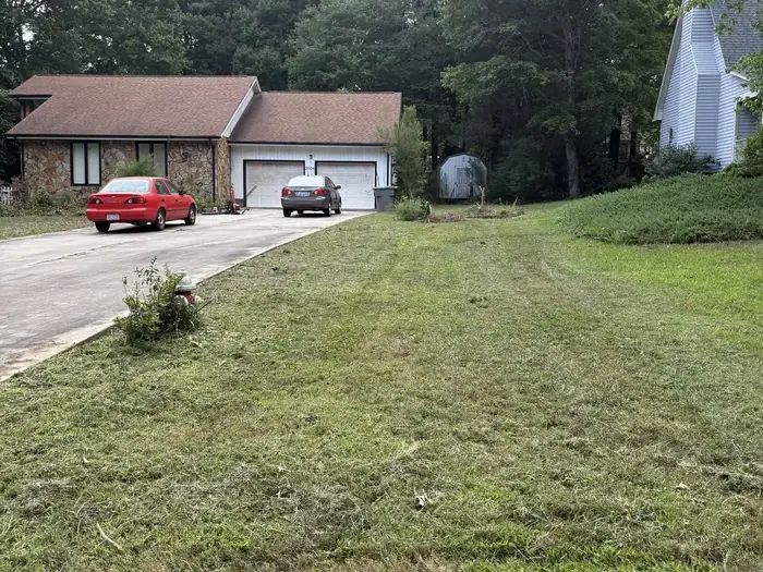 The same lawn along the driveway after Gaskins Lawn Care mowed it
