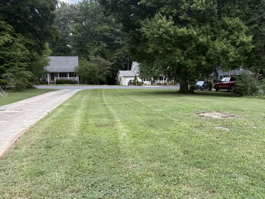 Mower stripes running across an open lawn after a full service cut by Gaskins Lawn Care